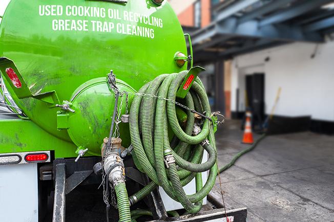 employees at Grease Trap Cleaning of Central Islip